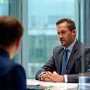 HR consultant in discussion with clients